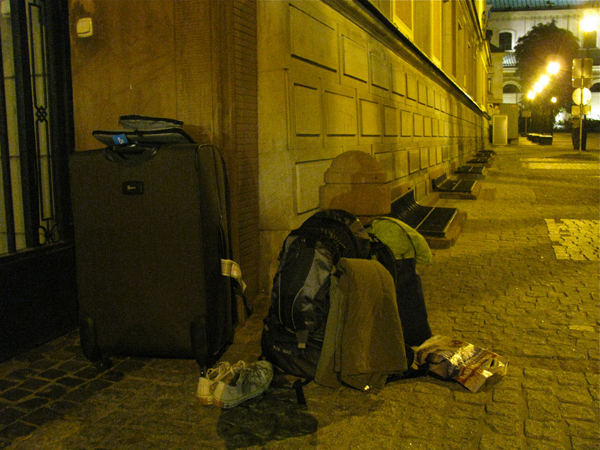 brown luggage and backpack